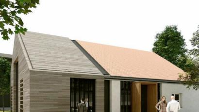 Bild: Architekturbüro Schönberger
Mit 11:4 Stimmen sprach sich der Stadtrat für das neue Konzept mit Steinfassade für Wand und Dach am Anbau (links) des zu sanierenden Bestandsgebäudes (rechts) in der Weidinger Straße aus.