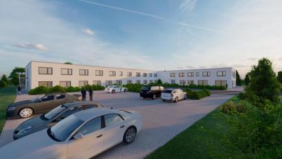 Bild: R &amp; K Projektbau GmbH &amp; Co. KG
Anhand von Bildern und Grundrissen erläuterte Alexander Robl vom Bauträger das Projekt. Im Garten hinter dem Gebäude ist Platz für Hochbeete und Gewächshäuser.