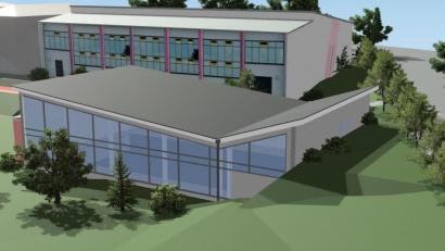 Archivbild: exb
So könnte es aussehen, wenn es fertig ist: Die Nordansicht der Schulschwimmhalle an der Altenstädter Straße mit ihrer großen Fensterfront. Im Hintergrund ist die bestehende Doppelsporthalle zu sehen.