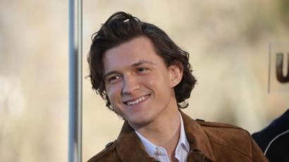 Bild: Isabel Infantes/EUROPA PRESS/dpa
Tom Holland bei der Präsentation des Films „Uncharted“ in Madrid.