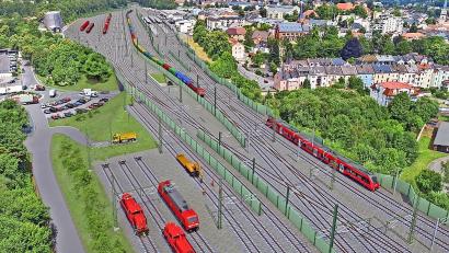 Bild: Visualisierung DB Netz AG
Der Bahnhof in Marktredwitz soll sich stark verändern. Die grünlichen Wände dienen dem Schallschutz.