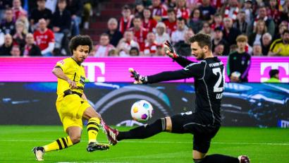 Bild: Tom Weller/dpa
Karim Adeyemi (l) brachte den BVB früh in Führung.