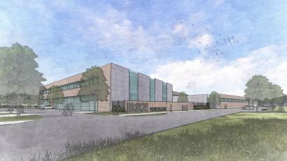 Grafik: Architekturbüro Hilgarth 
Zweistöckig soll der neue Gebäudekomplex der Berufsschulwerkstätten werden. Dadurch wird der Flächenverbrauch so gering wie möglich gehalten, obwohl sich die Nutzfläche verdoppelt. Die Skizze zeigt die Ansicht aus Richtung Bahnhof zur Basaltwerkstraße.