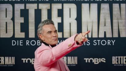 Bild: Henning Kaiser/dpa
Robbie Williams bei der Premiere.