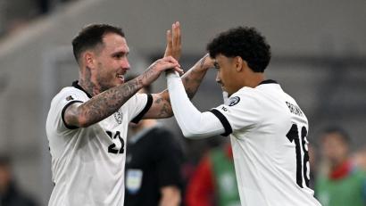 Bild: Federico Gambarini/dpa
Seit diesem Moment ist Nathaniel Brown (rechts) deutscher Nationalspieler: Am Freitagabend wurde er in der 82. Minute im Spiel gegen Luxemburg für David Raum eingewechselt.