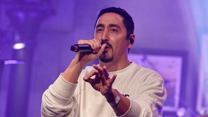 Bild: Georg Wendt/dpa
Rapper Eko Fresh setzt sich in einem neuen Song mit der „Stadtbild“-Debatte auseinander (Archivbild).