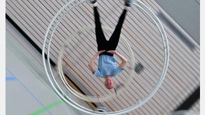 Bild: Arne Dedert/dpa
Im Rhönradturnen gibt es drei Disziplinen.