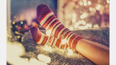 Symbolbild: Diana Drubig – stock.adobe.com
Auch an Weihnachten sollte genug Zeit bleiben, um einmal die Füße hochzulegen.