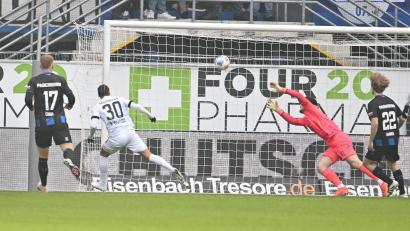 Bild: Swen Pförtner/dpa
Blitzstart für Münster zum 1:0.