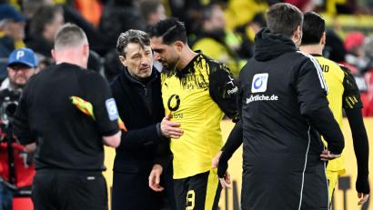 Bild: Federico Gambarini/dpa
Emre Can (m) musste beim Topspiel gegen den FC Bayern ausgewechselt werden.