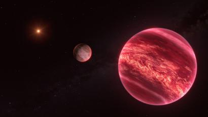 Bild: M. Kornmesser/ESO/dpa
Künstlerische Darstellung des Systems um den Stern CD-35 2722. Das System besteht aus einem Stern, einem Braunen Zwerg und einem Satelliten.
