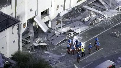 Bild: -/kyodo/dpa
Laut Japans Regierung kamen mindestens 13 Menschen infolge des Bebens ums Leben.