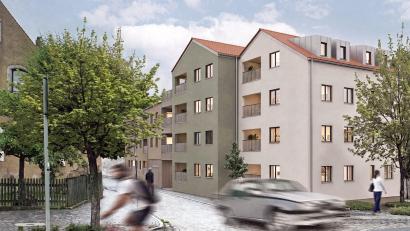 Bildmontage: bildraumwest gbr
Am Vohenstraußer Marktplatz ist an der Abzweigung zur Ringgasse ein Mehrfamilienhaus mit 16 Wohneinheiten geplant. Bauherren sind Christian und Sarah Wolf, die mit ihrer Firma Wolf Projektsachen GmbH, auch ein Wärmenetz errichten wollen.