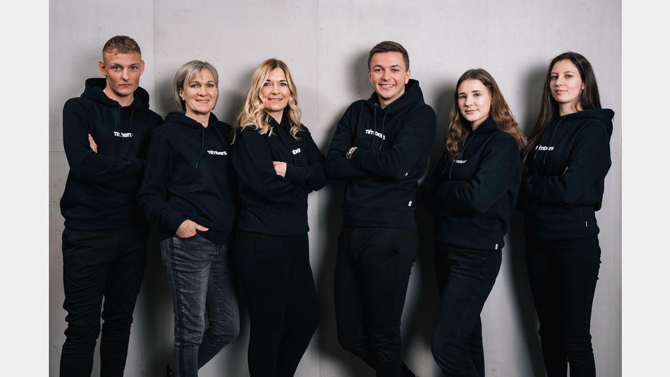 Das „Timbers“-Team mit Managing Director Tim Bergemann (Dritter von rechts). Bild: exb